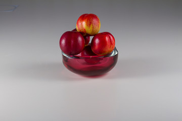 still life: fruit, crystal fruit bowl with peaches
