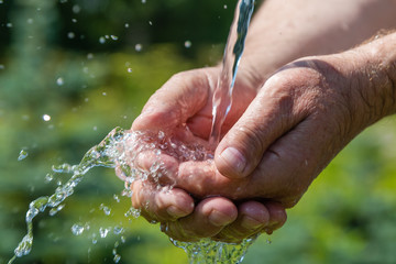 Hand washing in running water.