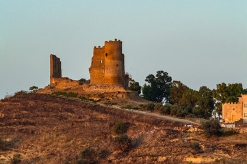 Fototapeta premium View of Mazzarino Medieval Castle with the Lights of Sunset, Caltanissetta, Sicily, Italy, Europe