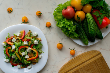 salad with fitaki, tomato, cucember and pepper	