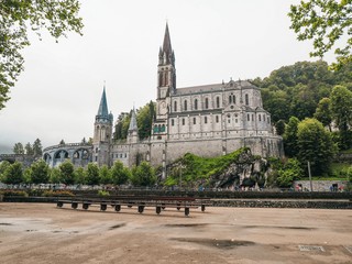 Obraz premium Sanctuary in Lourdes in France, cloudy weather