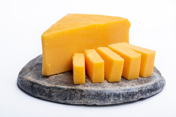 Cheddar cheese collection, piece of yellow Cheddar cheese made from cow milk