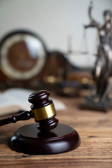 The law concept background. Mallet of the judge and legal code © zolnierek