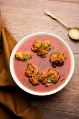 Lauki Kofta Curry made using Bottel Gourd or Doodhi, served in a bowl or karahi. selective focus