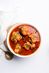 Lauki Kofta Curry made using Bottel Gourd or Doodhi, served in a bowl or karahi. selective focus