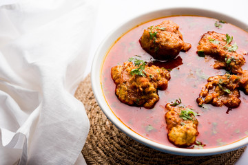 Lauki Kofta Curry made using Bottel Gourd or Doodhi, served in a bowl or karahi. selective focus