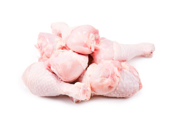 Tasty raw chicken legs. Top view. Isolated on white