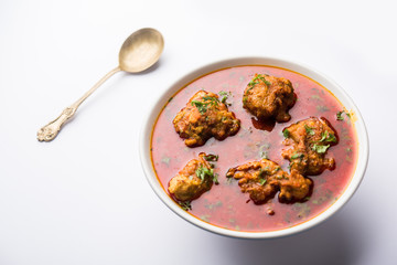 Lauki Kofta Curry made using Bottel Gourd or Doodhi, served in a bowl or karahi. selective focus