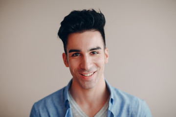 Obraz premium Portrait closeup of stylish young man inside apartments