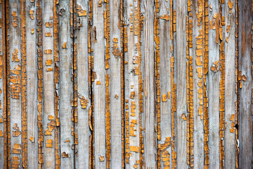 The surface of the vertical wooden slats