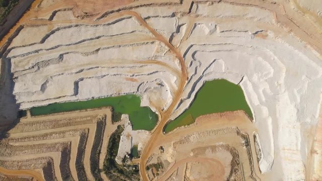 TURNOV, CZECH REPUBLIC - JUNE, 2019: Aerial drone view of a chalkpit near Turnov city.