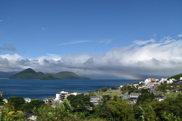 Landscape with Lake Toya and rainbow in Toya, Hokkaido, Japan