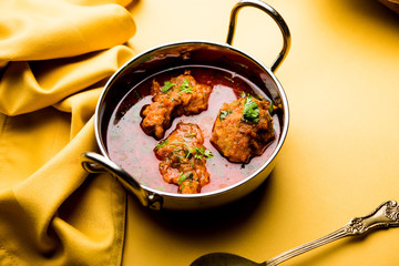Lauki Kofta Curry made using Bottel Gourd or Doodhi, served in a bowl or karahi. selective focus