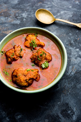 Lauki Kofta Curry made using Bottel Gourd or Doodhi, served in a bowl or karahi. selective focus