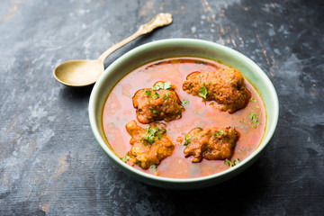 Lauki Kofta Curry made using Bottel Gourd or Doodhi, served in a bowl or karahi. selective focus