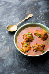 Lauki Kofta Curry made using Bottel Gourd or Doodhi, served in a bowl or karahi. selective focus