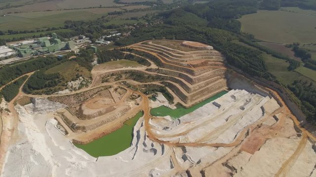 TURNOV, CZECH REPUBLIC - JUNE, 2019: Aerial drone view of a chalkpit near Turnov city.