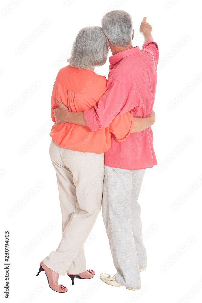 Wall mural perfect old couple posing on a white background, back view