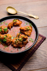 Lauki Kofta Curry made using Bottel Gourd or Doodhi, served in a bowl or karahi. selective focus