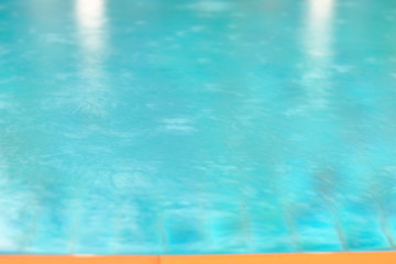 Rainy season in swimming pool background