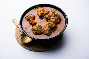 Lauki Kofta Curry made using Bottel Gourd or Doodhi, served in a bowl or karahi. selective focus