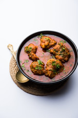 Lauki Kofta Curry made using Bottel Gourd or Doodhi, served in a bowl or karahi. selective focus