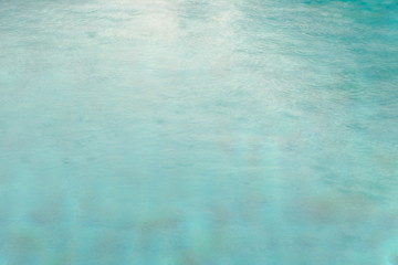 Rainy season in swimming pool background