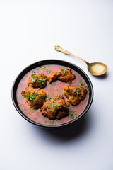 Lauki Kofta Curry made using Bottel Gourd or Doodhi, served in a bowl or karahi. selective focus