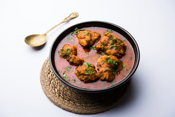 Lauki Kofta Curry made using Bottel Gourd or Doodhi, served in a bowl or karahi. selective focus