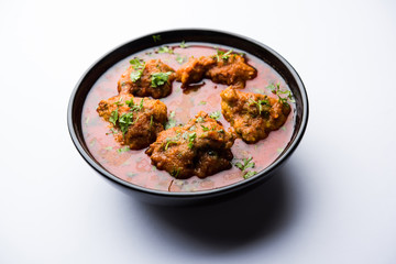 Lauki Kofta Curry made using Bottel Gourd or Doodhi, served in a bowl or karahi. selective focus