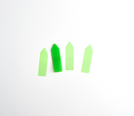 plastic green velcro bookmark for paper on white background