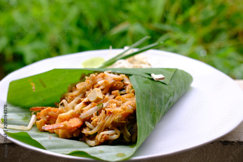 Canvas Prints close up pad thai with shrimp in banana leaf