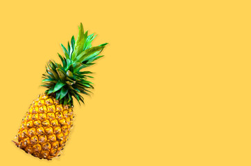 Creative layout made of pineapple. Flat lay foods concept on yellow background