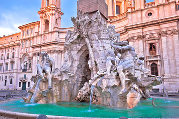 Naklejka premium Piazza Navona square Fontana dei Fiumi and church dawn view