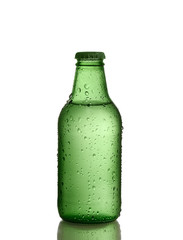 Small bottle with drops on white background