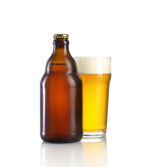 Bottle of beer and a glass on a white background