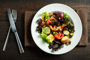 fresh vegetable salad on wooden.
