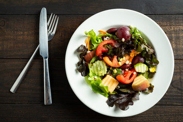 fresh vegetable salad on wooden.
