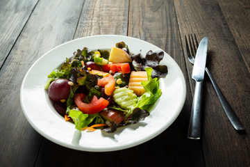 fresh vegetable salad on wooden.