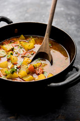 Lauki/doodhi ki Sabji also known as bottle gourd curry. served in a bowl or karahi. selective focus