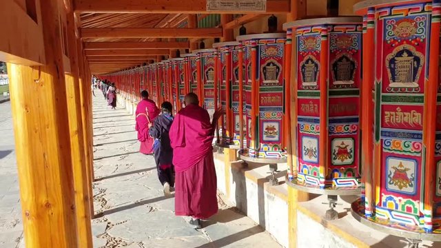 Tibetean monastery in Labrang monks and lokal people praying