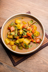 Lauki/doodhi ki Sabji also known as bottle gourd curry. served in a bowl or karahi. selective focus