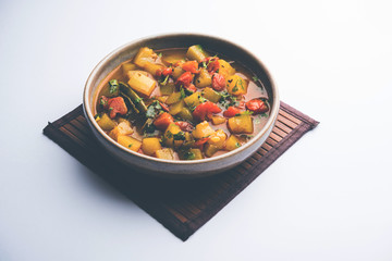 Lauki/doodhi ki Sabji also known as bottle gourd curry. served in a bowl or karahi. selective focus