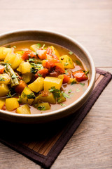 Lauki/doodhi ki Sabji also known as bottle gourd curry. served in a bowl or karahi. selective focus