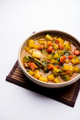 Lauki/doodhi ki Sabji also known as bottle gourd curry. served in a bowl or karahi. selective focus