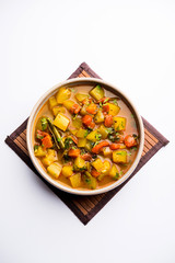 Lauki/doodhi ki Sabji also known as bottle gourd curry. served in a bowl or karahi. selective focus