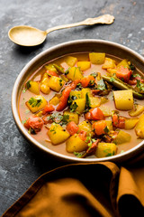 Lauki/doodhi ki Sabji also known as bottle gourd curry. served in a bowl or karahi. selective focus