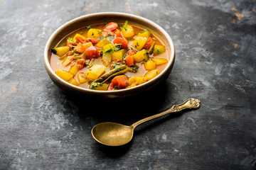 Lauki/doodhi ki Sabji also known as bottle gourd curry. served in a bowl or karahi. selective focus