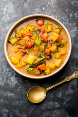 Lauki/doodhi ki Sabji also known as bottle gourd curry. served in a bowl or karahi. selective focus