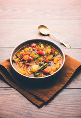 Lauki/doodhi ki Sabji also known as bottle gourd curry. served in a bowl or karahi. selective focus